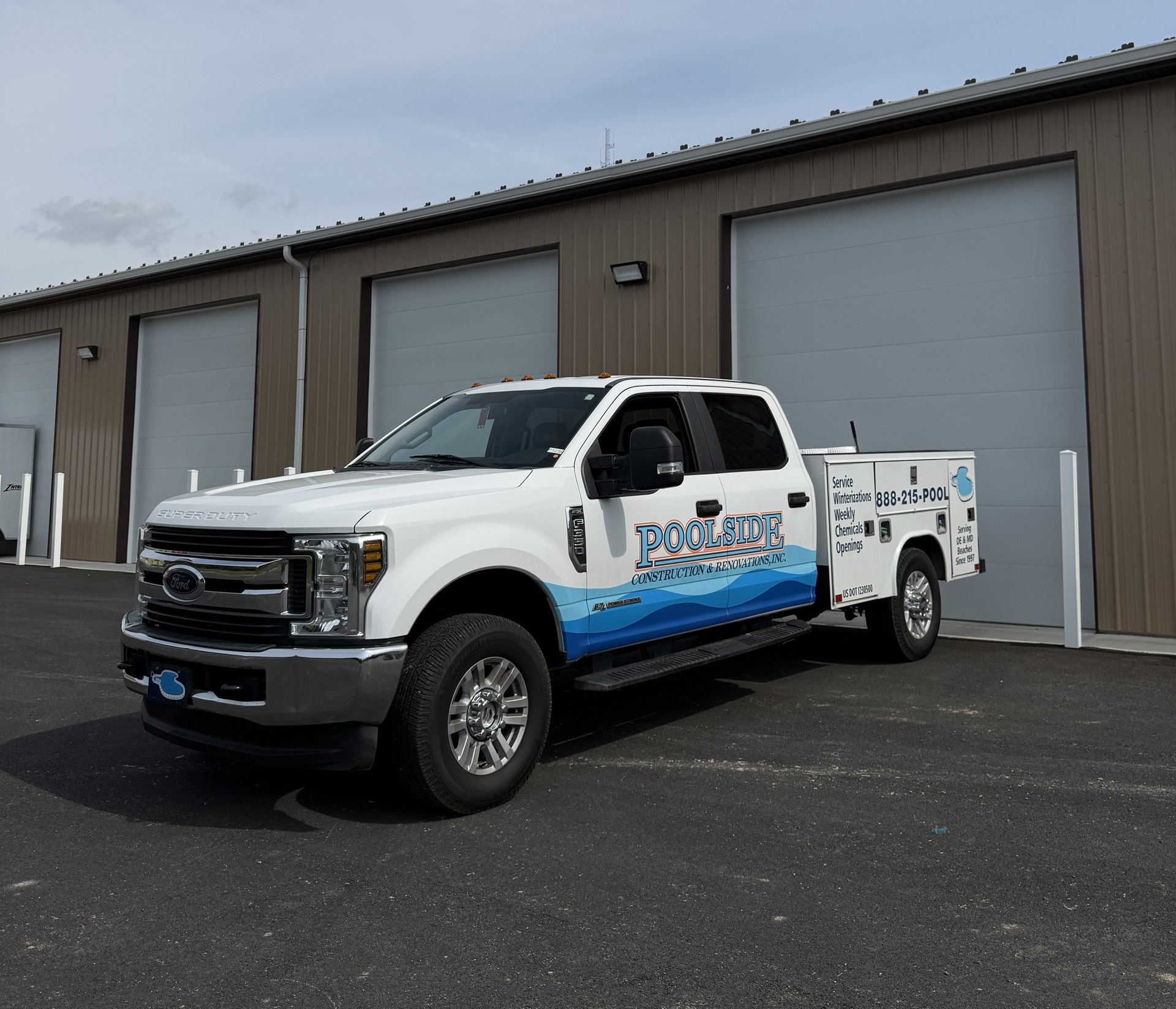Poolside Construction & Renovations — branded work truck by Coastal Wraps